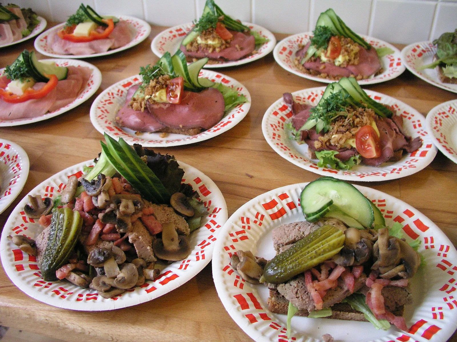 Several traditional Danish open sandwiches on a table